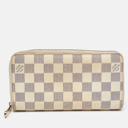 Louis Vuitton: Белый кошелёк  Zippy