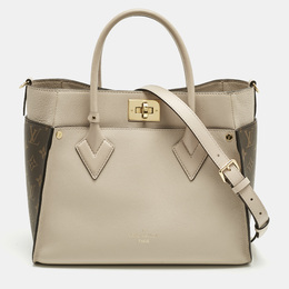 Louis Vuitton: Бежевая сумка-шоппер 