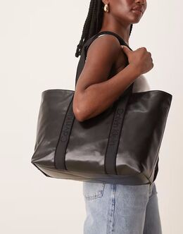 Большая блестящая сумка-тоут Calvin Klein Jean черного цвета Calvin Klein 143294934 | black