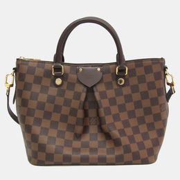 Louis Vuitton: Коричневая сумка 