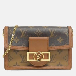 Louis Vuitton: Коричневый кошелёк 