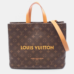 Louis Vuitton: Коричневая сумка-шоппер 