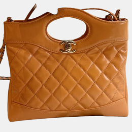 Chanel: Оранжевая сумка 