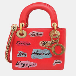 Dior: Оранжевая сумка 