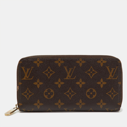 Louis Vuitton: Коричневый кошелёк  Zippy