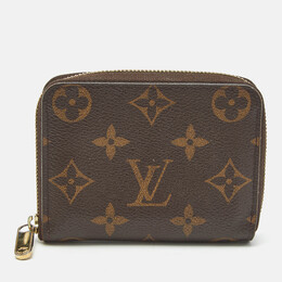 Louis Vuitton: Коричневый кошелёк  Zippy