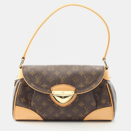 Louis Vuitton: Коричневая сумка 