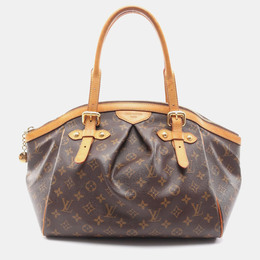 Louis Vuitton: Коричневая сумка 