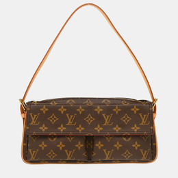 Louis Vuitton: Коричневая сумка 