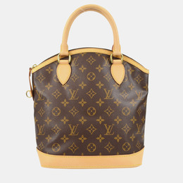 Louis Vuitton: Коричневая сумка  Lockit