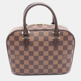 Louis Vuitton: Коричневая сумка 