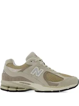 New Balance: Бежевые кроссовки  2002R