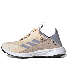 Кроссовки terrex voyager 21 slip on heat.rdy travel кроссовки Adidas, желтый hp8625 | sand strata / silver violet / acid orange
