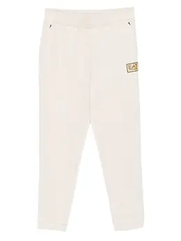 Ea7 Emporio Armani: Бежевые брюки 