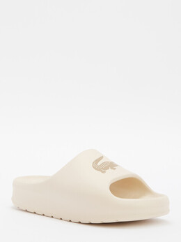 Lacoste: Бежевые шлёпанцы 