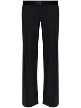 Victoria Beckham: Чёрные брюки 