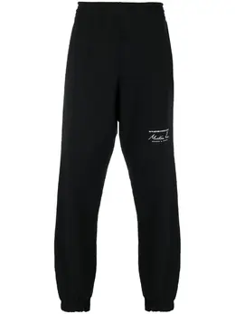 Martine Rose: Брюки с принтом 