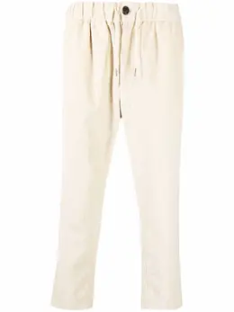 AMI Paris: Бежевые брюки 