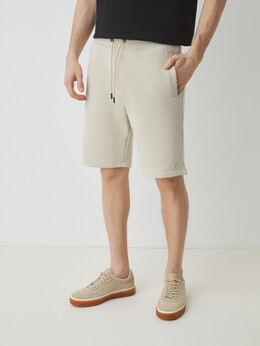 Guess: Бежевые шорты 