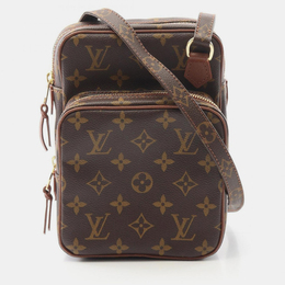 Louis Vuitton: Коричневая сумка 