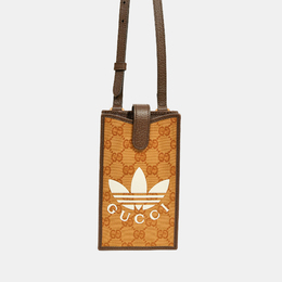 Gucci: Коричневая сумка через плечо 