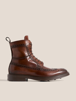 Dino Bigioni: Красные ботинки 